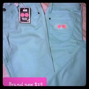 Brand new Scarlet Boulevard turquoise skinny pants